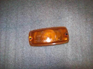 FIAT 850 FANALE ANTERIORE SX TRASPARENTE MATERIALE EPOCA ARANCIONE - Imagen 1 de 2