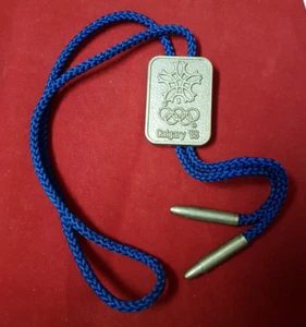 Calgary 1988 Winter Olympics Bolo Tie. Blue Ties. Excellent Condition. - Picture 1 of 5
