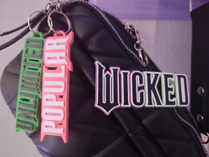 WICKED musikalisches Schlüsselanhänger-Set - Elphaba, Glinda, Zauberer von Oz - Bild 1 von 6
