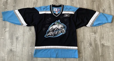 Camiseta de hockey firmada por el equipo Alaska Aces adulto grande anclaje ECHL Reebok Foto 1 de 4