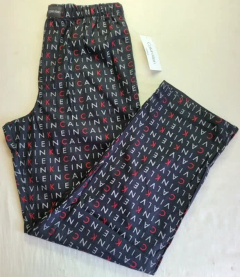 Pijama polar Calvin Klein pantalones para dormir de salón medianos negros con logotipo completo precio de venta sugerido por el fabricante 42 USD Foto 1 de 4
