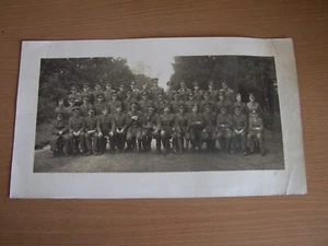 Foto grande militar vintage soldados con bastones y diferentes uniformes para perros - Imagen 1 de 2