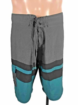Pantalones cortos/baúl de baño Ocean Current para hombre verde azulado y negro 36 Foto 1 de 4