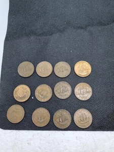 Pacchetto monete mezzo penny inglesi vari anni - Foto 1 di 7