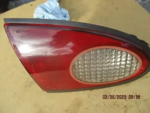 Ford Contour 1995-97 sedán tapa del maletero montado luz trasera izquierda - Imagen 1 de 3