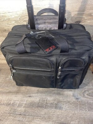 TUMI BLACK BALLISTIC NYLON 2 HANDLE 2 WHEELED ROLL OVERNIGHT TRAVEL Breifcase - Image 1 of 4