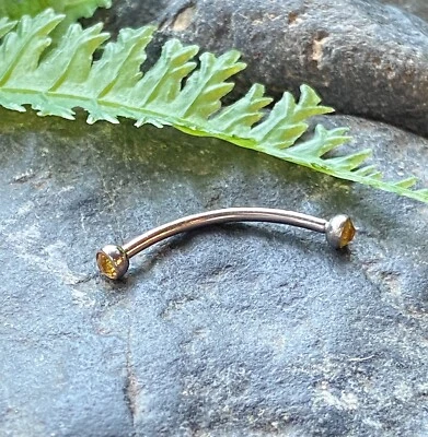 1 pieza Piercing Ojo de Serpiente Barra Curvada Lengua o Anillo de Cejas Doble Gema 16g 9/16 Foto 1 de 3