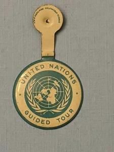 Prendedor de botón de metal plegable con lengüeta visita guiada de las Naciones Unidas de colección - Imagen 1 de 4