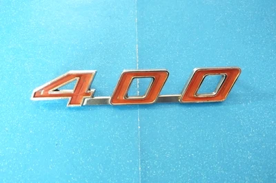 Pontiac Firebird 1967-1969 emblema capó rojo y cromado Foto 1 de 4