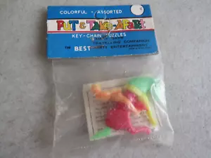 MIP VINTAGE COWBOY ON HORSE PUT & TAKE APART KEYCHAIN PUZZLE DIME STORE TOY D5 - Picture 1 of 2