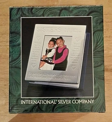 Álbumes de fotos International Silver Company Sisters libros con capacidad para 100 fotos 4x6 B23 Foto 1 de 4
