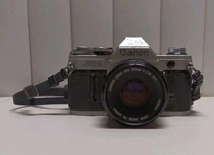 Canon AE-1 Program analoge Spiegelreflexkamera 35 mm mit Objektiv 50 mm 1:1,8  - Bild 1 von 7