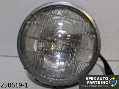 OEM 1980-1987 Jaguar XJ6 4.2L Halogen Front Round Headlight Lamp - Image 1 of 4