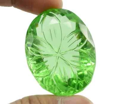 Carved 130.85 Carat Certified Oval Shape Natural Green Topaz Loose Gemstone - Image 1 of 3