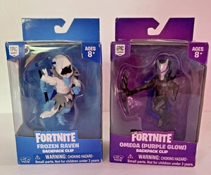 Fortnite Lot of 2 Backpack Clips Frozen Raven, Omega Purple Glow  New - Picture 1 of 6