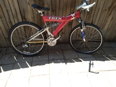 trek bicycle red. Shimano w/front and rear suspension. Local pickup only. - Image 1 of 4