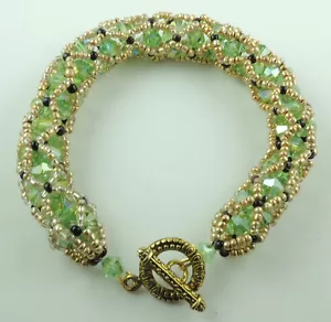 Armband mit grünen Kristallen & Gold & schwarzen Rocailles Hochzeit Übergröße - Bild 1 von 2