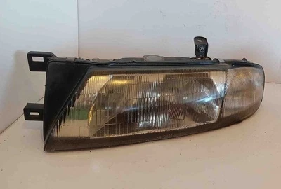 Luz de cabeza del conductor Altima GXE 1997 usada OEM Foto 1 de 4