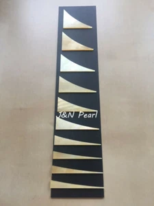 Juego seleccionado de incrustaciones de aleta de tiburón madre perla dorado para guitarra estilo Jackson 10 piezas - Imagen 1 de 6