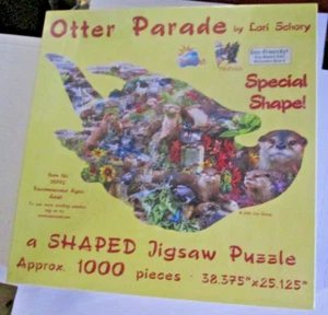 Sealed SunsOut Shaped 1000 Pc Puzzle "OTTER PARADE" Lori Schory 2013 OOP - Picture 1 of 3