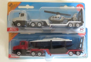 2 Tieflader mit Boot / Hubschrauber Siku 1610 / 1613 OVP - Bild 1 von 6