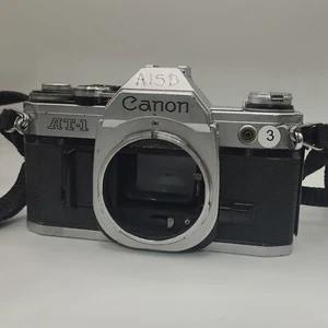 Canon AT-1 fotocamera reflex argento pellicola 35 mm solo corpo Mcm - Foto 1 di 5