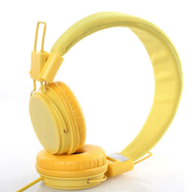 Yellow hairamber eyesgold tatoosblack headphones