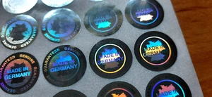 64 Stück "Made in Germany" Hologramm Siegel Aufkleber Etikett 20 mm Sticker - Bild 1 von 2
