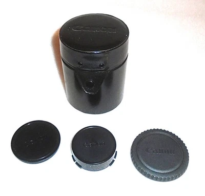Estuche rígido negro genuino para lentes Canon interior acolchado de 4" x 3" y 3 tapas para lentes Canon Foto 1 de 3
