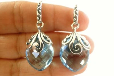 Pendientes colgantes de plata de ley 925 ornamentados con topacio azul Foto 1 de 3