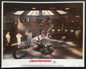 Richard Jordan as Grock  Sarah Douglas at the lab.  Solarbabies lobby card 4068