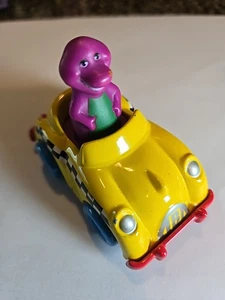 Barney The Purple Dinosaur Driving a Yellow Taxi Toy Car The Lyons Group 1993 - Picture 1 of 10