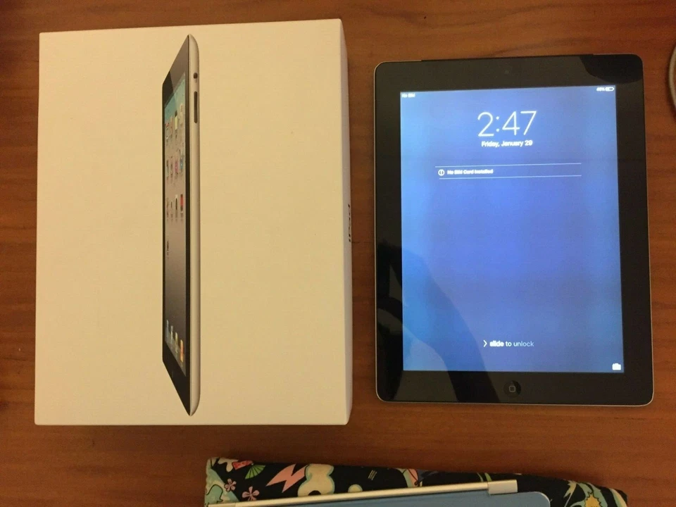 Apple iPad 2 Wi-Fi + 3G Cellular 16GB  Black A1396 and Blue Smart Cover + Pouch - Image 1 of 4