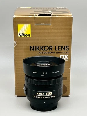 Nikon AF-S DX NIKKOR 35mm f/1.8G Lens + Hood + Caps + Box – Excellent Condition - Image 1 of 4