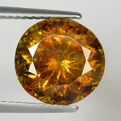 6.43 ct  DAZZLING  BROWNISH ORANGE 100% NATURAL SPHALERITE - Round - 1296 ST - Image 1 of 2