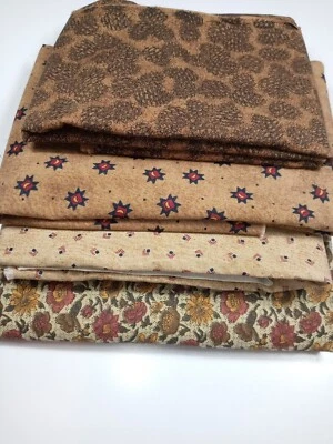 Fabric Lot of 4 Pieces Each 1/2 Yard Browns Floral/Pine Cones/Geometric - Image 1 of 2
