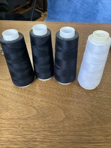 4 Cones Of Sewing Thread 3 Black 1 White Slightly Dusty, Appear Unused - Picture 1 of 9