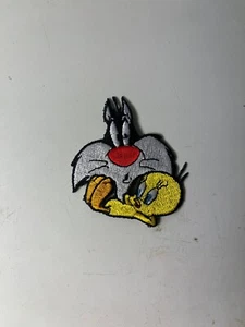 Looney Tunes Sylvester The Cat and Tweety Bird Iron On Patch - Imagen 1 de 3