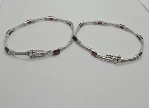 Bracciali bianchi tondi e viola quadrati strass tono argento 7” chiusura look - Foto 1 di 13