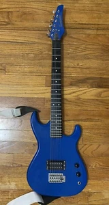 Guitarra Eléctrica Vintage Años 80 "The SHREDDER" Azul Brillo SHGI2TBL con Estuche JUNIOR - Imagen 1 de 24