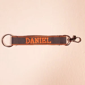 DANIEL Embroidered Name Strap Key Ring Keychain with Clasp Gray & Orange - Picture 1 of 10