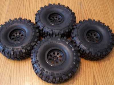 Axial 1/10 RBX10 RYFT 2.2 Raceline Monster Black 12mm Wheels TSL Bogger Tires - Image 1 of 4