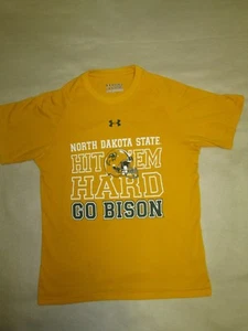 NDSU GO"BISON" CHILD MED "UNDER ARMOUR" SHIRT YMD LOOSE HEAT GEAR "HIT EM HARD" - Picture 1 of 5