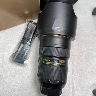 Lente Nikon AF-S NIKKOR 24-70 mm f/2,8G ED excelente Foto 1 de 4