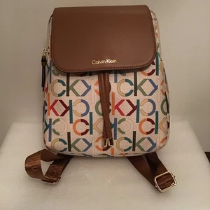 Calvin Klein Brown Flap Backpack Tan with Multicolor Monogram Letters MSRP $178 - Picture 1 of 6