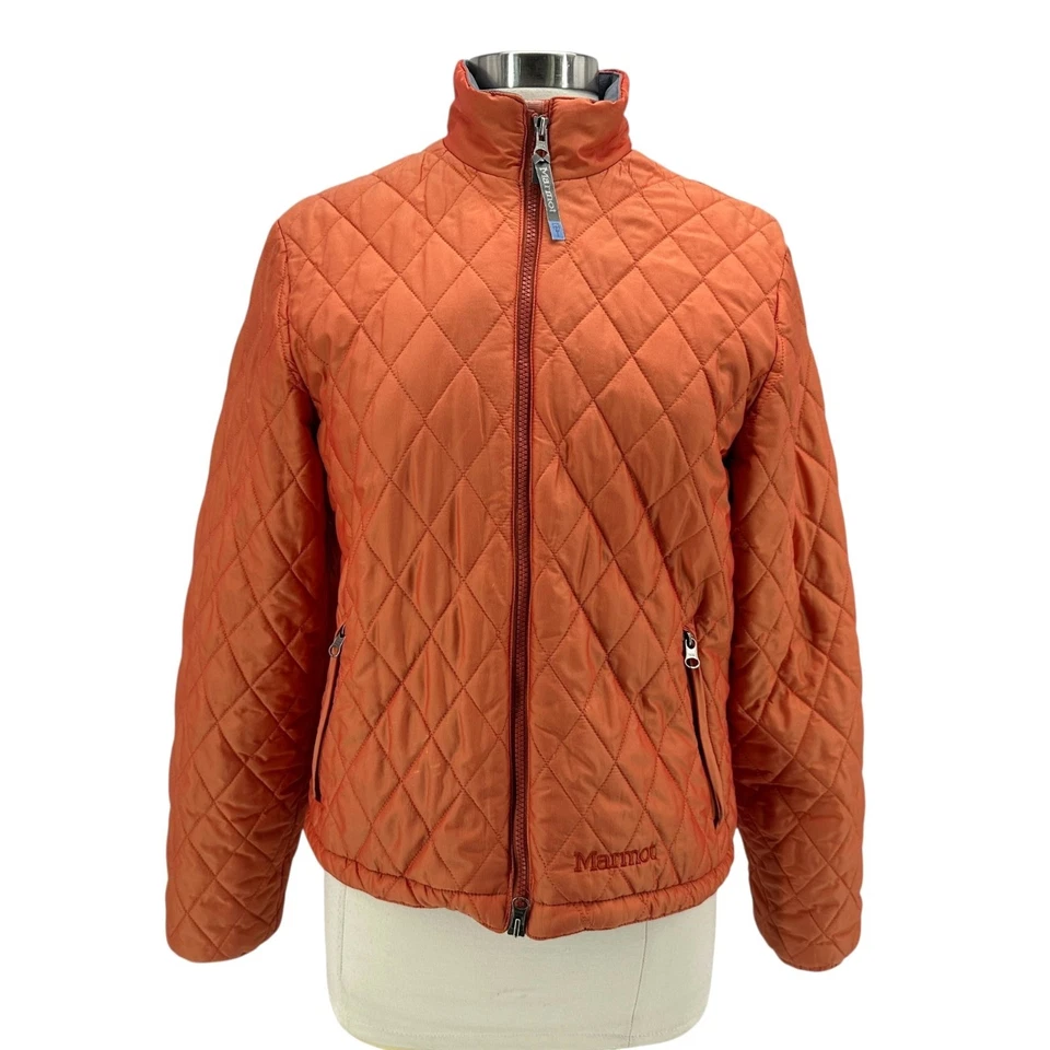 Chaqueta mediana para mujer Marmot Primaloft acolchada naranja forrada de vellón Foto 1 de 4