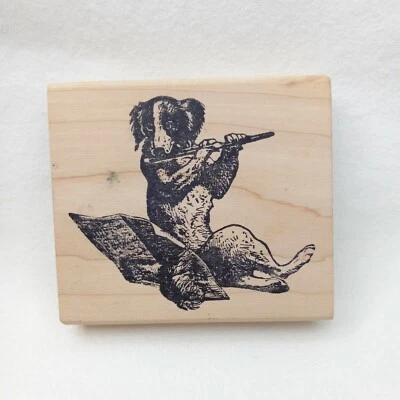 Sello de goma de flauta para jugar perros magenta de perro antropomórfico hecho en Canadá Foto 1 de 4