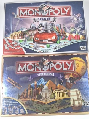 2x Monopoly unbespielt: Weltreise (2003) + Heute (2005, Berlin) Metallfiguren - Bild 1 von 4