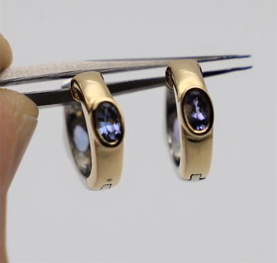 Pendientes de aro de oro amarillo y blanco de dos tonos de 14k con tanzanita de 4,2 g Foto 1 de 4
