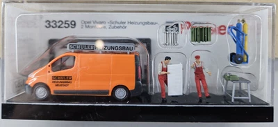Figuras pintadas a mano escala Preiser HO #33259 - Furgoneta de mantenimiento Opel con instaladores Foto 1 de 4